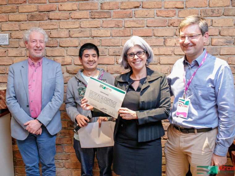 CADathlon Brasil 2022 dinner and award session first place awarding with representative professor from UnB
